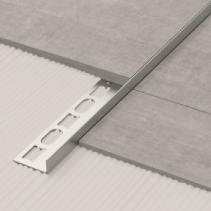 chrome movement joint profile in grey ceramic tiling