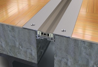 aluminum expansion joint cover on parquet with beige rubber insert